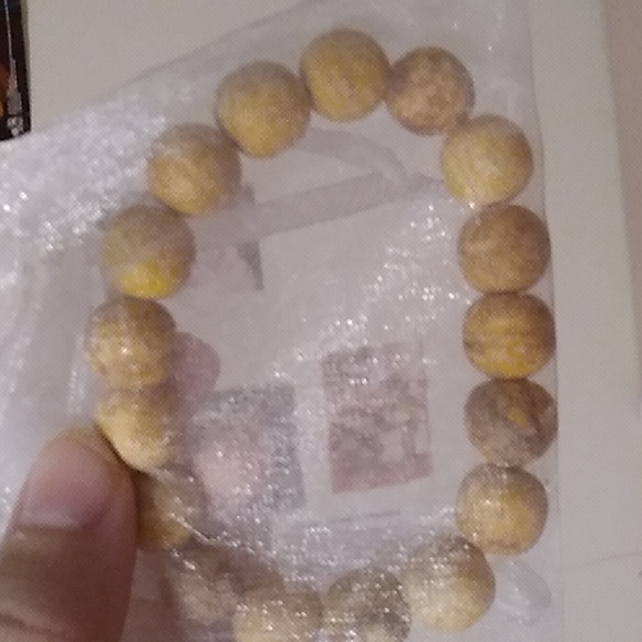 Wood bracelet and bag included - Picture 1 of 1